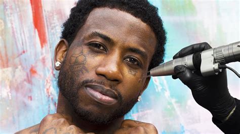 did gucci maine remove face tatto|Gucci Mane face.